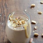 Healthy Paleo Snickers Smoothie on Wooden Table