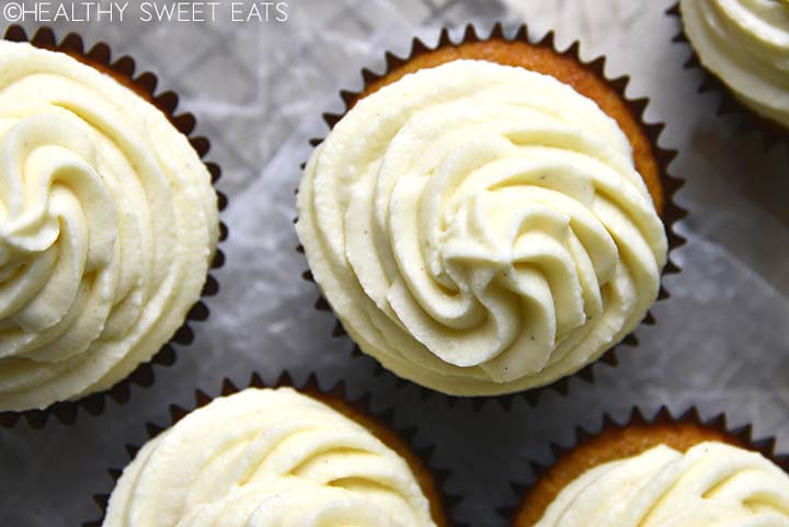 top view of swirls of vanilla buttercream frosting on keto vanilla cupcakes